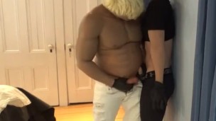 muscle man in white jeans has fun with cropped top jock