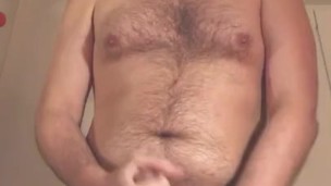 Mature bear with moustache handjob
