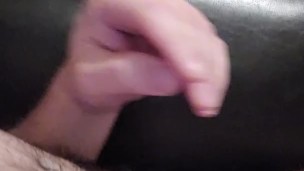 Hot hairy guy cumming on his stomach