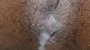 Cum running from Jamaican ass with clit.