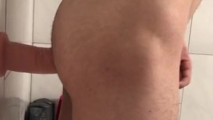 cute white boy plays with huge dildo