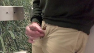Jerking off and cumming in the airport bathroom before a flight.