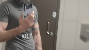 Muscle Daddy Jerks Off In Public Bathroom