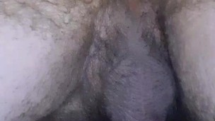 Bottom fucks her hole with a big dildo and cums