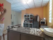 A naked housewife is preparing dinner in the kitchen. The depraved whimsical housekeeper Bra 1 11/16