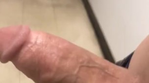 Taking out my hard cock in the bathroom at work 