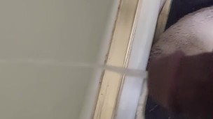 Big black dick pissing in tub