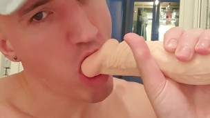 Sucking on 9 Inch dildo