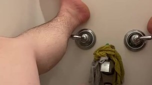 Jacking off in the tub.