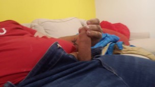 Jerking uncut cock to satisfying orgasm