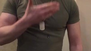 Muscular army guy flexing big biceps and shooting cum, ready to fight!