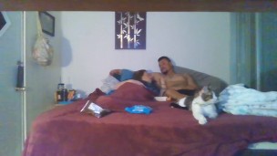Couple smoking and cuddling