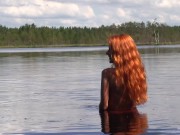Naked Redhead Teen Plays with a Water Lily 3/16