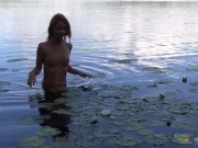 Naked Redhead Teen Plays with a Water Lily 4/16