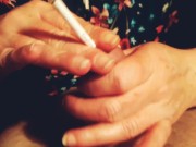 She likes to play with my cock and smoke a cigarette 2/16