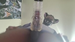 Black catboy cums loudly after fucking fleshlight
