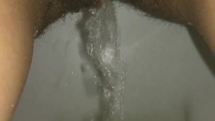Pissing in the toilet / pee in a glass / peeing girl / golden splashes / hairy pussy