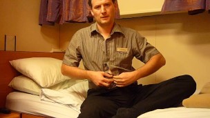 Kudoslong on a bed strips naked and pulls his foreskin and wanks his cock with his feet