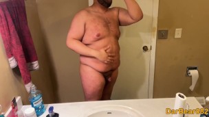 Just a fat guy showing off his body.