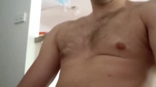 Clean Shaven Frat Boy Blows a Thick Load on His Chest