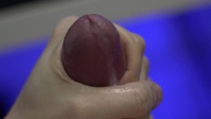 Slow motion cumshot from large cock