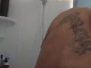 Tattoo hunk caught taking a shower