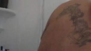 Tattoo hunk caught taking a shower