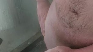 Playing with my uncut cock in the shower again