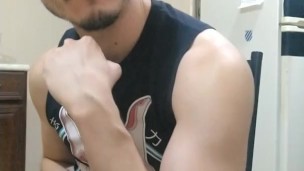 Handsome man flexing and showing off flaccid long cock
