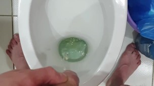 Pissing in toilet 