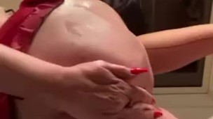 Oily curvy ass in red garter belt 