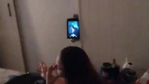 White cute milf in night dress smoking and watching TV