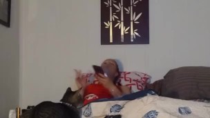 White milf smoking while watching videos on her phone