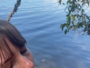 Cumming in my wife's mouth at the lake! 14/16