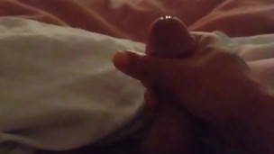 Sexy stud shoots a thick load on his stomach