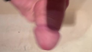 The guy in the bathroom jerked off his fat dick and cummed