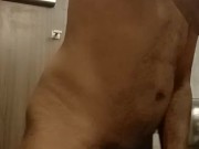 Stroking my big dick in the hotel bathroom while housekeeping is in the other room.  3/16