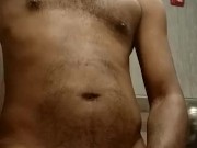 Stroking my big dick in the hotel bathroom while housekeeping is in the other room.  9/16