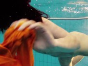 Swimming pool erotics in cute fishnets 12/16