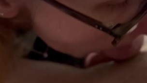 young with glasses gives a blowjob without hands