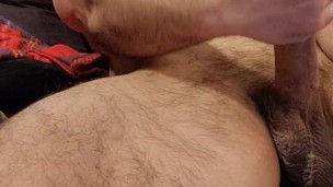 Close up of HAIRY MUSCLE BEAR STROKING COCK