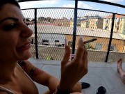 Two girlfriends smoke a cigarette 14/16