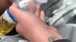Friend took a piss in a bottle in car. 
