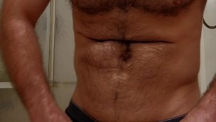MUSCLE BEAR FLEXING IN BOXER BRIEFS