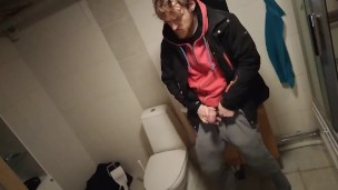 Muscular young bull with huge muscular thighs masturbating after a sweaty session at the gym