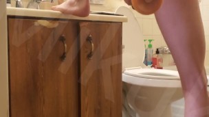 Hot Skinny Twink Fucks himself with big dildo in bathroom
