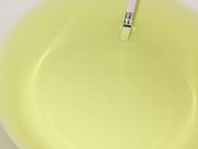 Girl pissing on plate over the toilet and doing an ovulation test 11/16