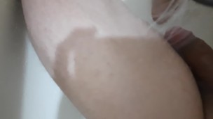 dirty worker is tired after work and takes a shower 