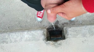 Uncut cock piss on a bridge through hole