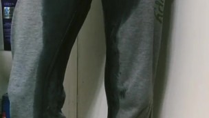 chole fields pees in grey sweats